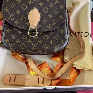 Vintage Louis Vuitton purse. Over the shoulder strap. Original packaging